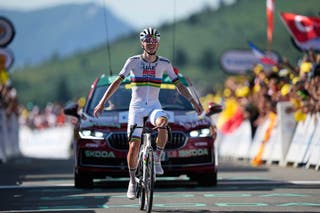 Pogacar blasted past all his rivals to win stage 12 and move back into the race lead